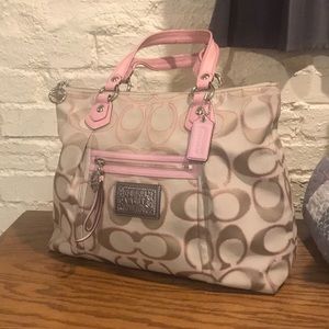 Tan and pink coach tote bag.